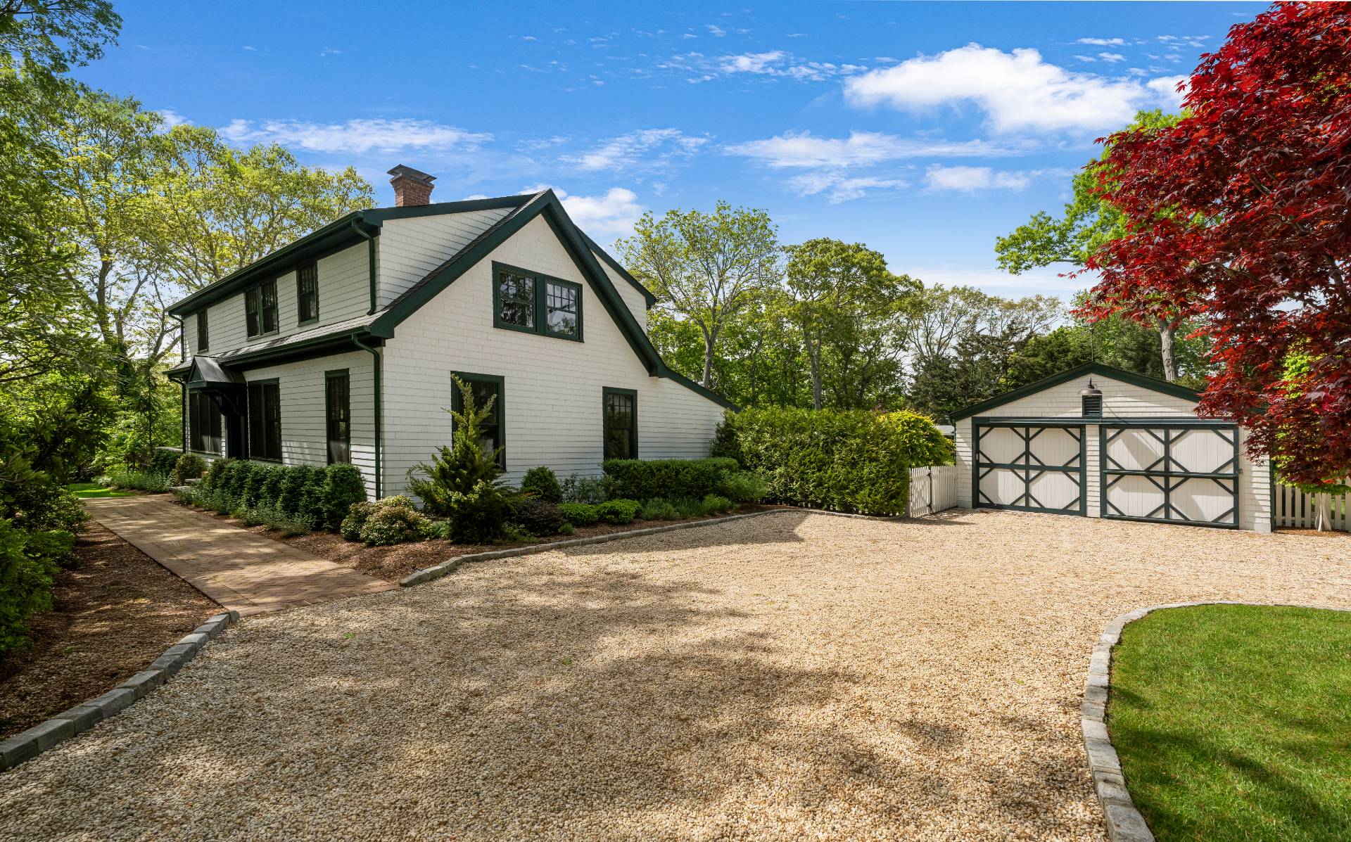 91 East Tiana Road Hampton Bays, NY 11946 - Photo 45 of 46 a view of a house with a yard