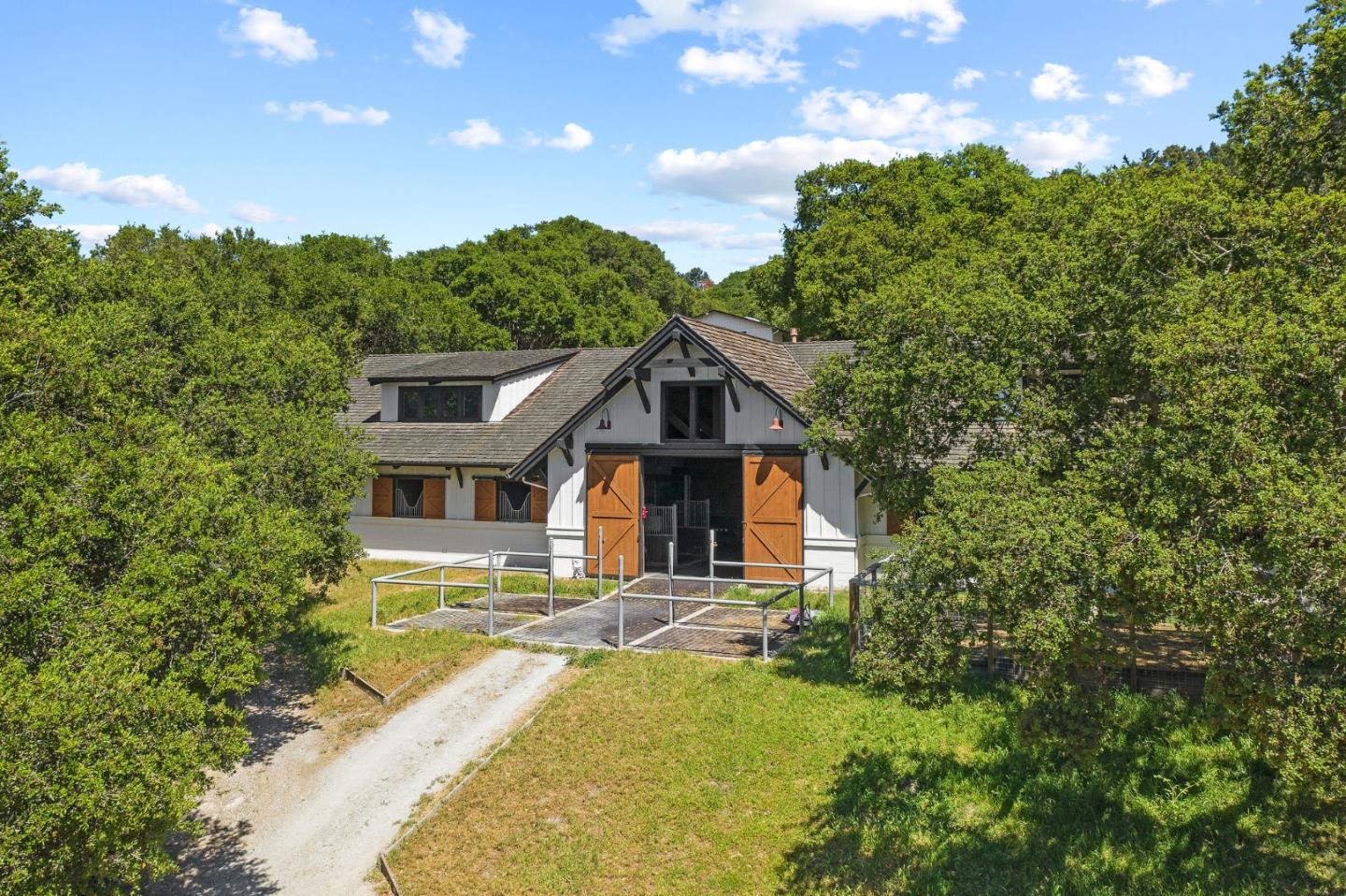 11627 Hidden Hills Road Carmel Valley, CA 93924 - Photo 15 of 62 a view of a house with roof and sitting area