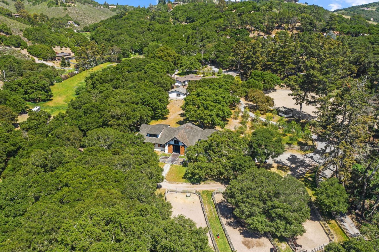11627 Hidden Hills Road Carmel Valley, CA 93924 - Photo 16 of 62 an aerial view of residential house with outdoor space and trees all around