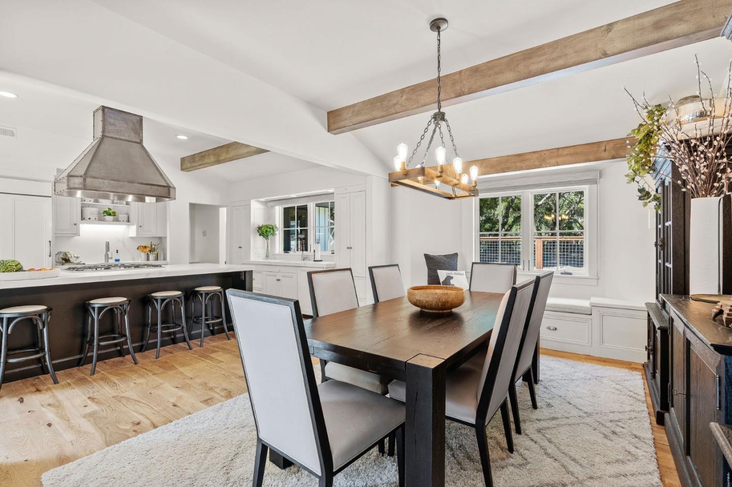 11627 Hidden Hills Road Carmel Valley, CA 93924 - Photo 18 of 62 a dining room with furniture window and wooden floor