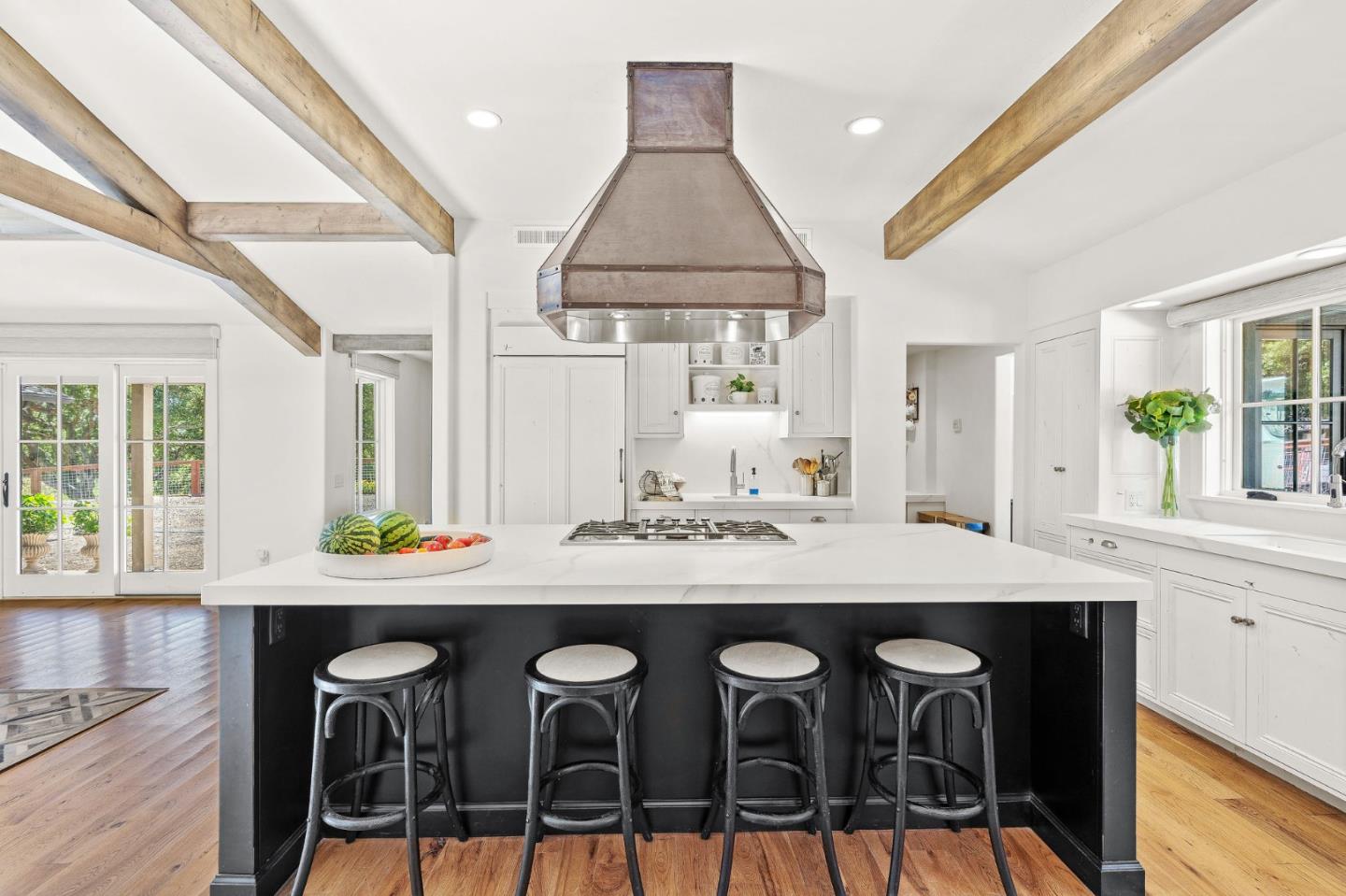 11627 Hidden Hills Road Carmel Valley, CA 93924 - Photo 19 of 62 a kitchen with a table and chairs in it
