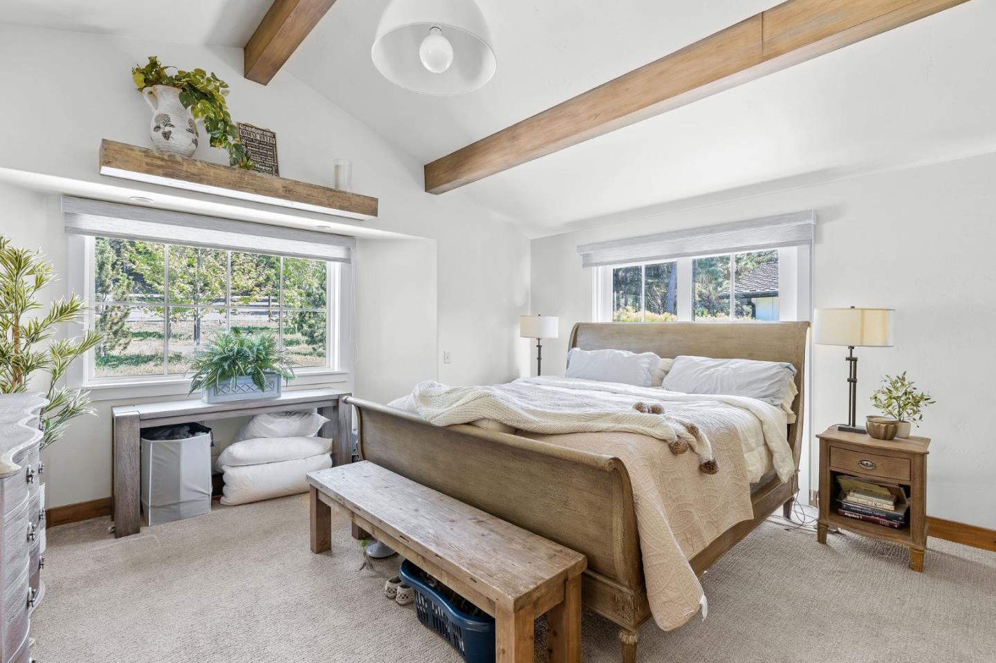 11627 Hidden Hills Road Carmel Valley, CA 93924 - Photo 30 of 62 a bedroom with a bed chair and a window