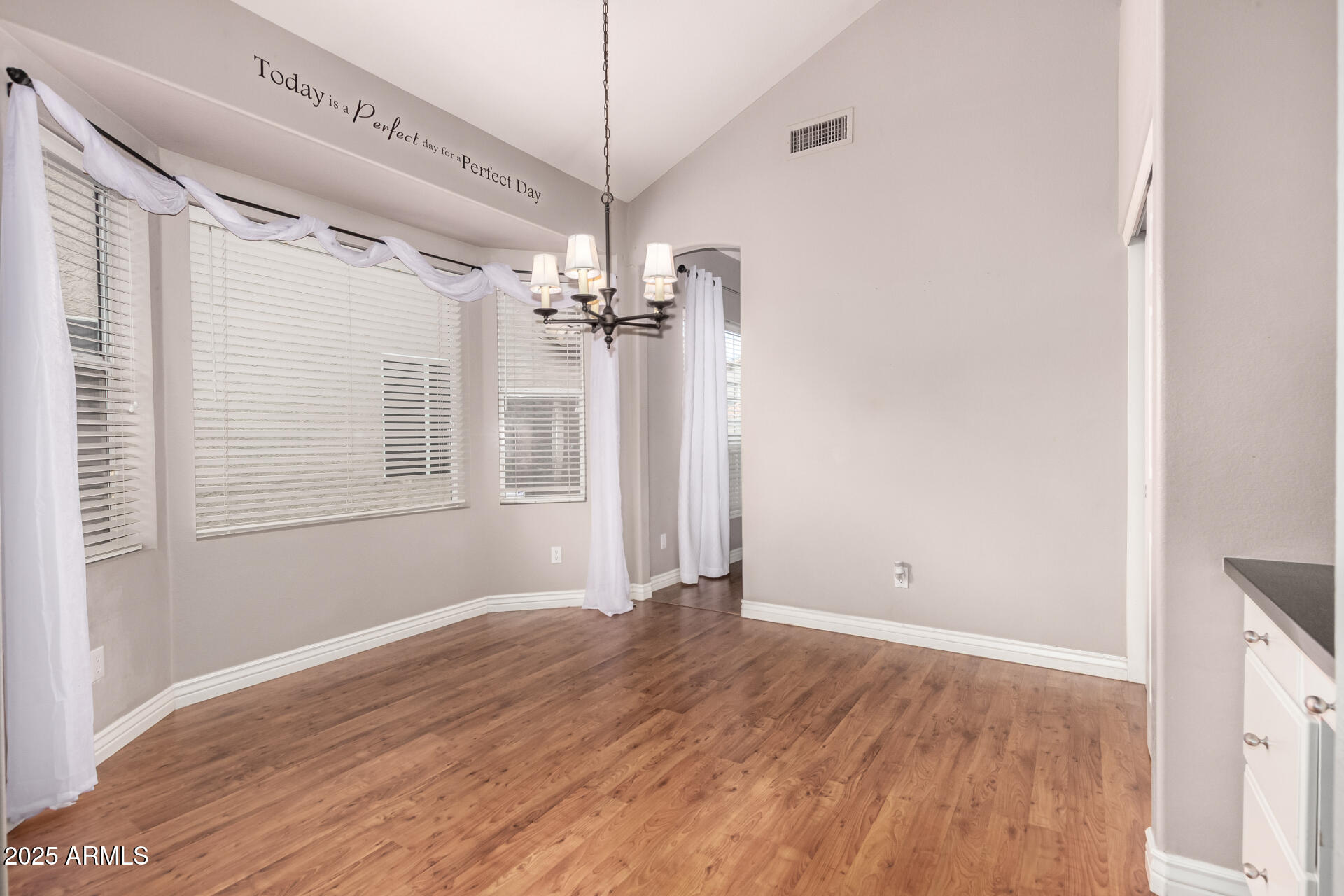 1284 North Conner Avenue Gilbert, AZ 85209 - Photo 11 of 45 wooden floor in an empty room with a window