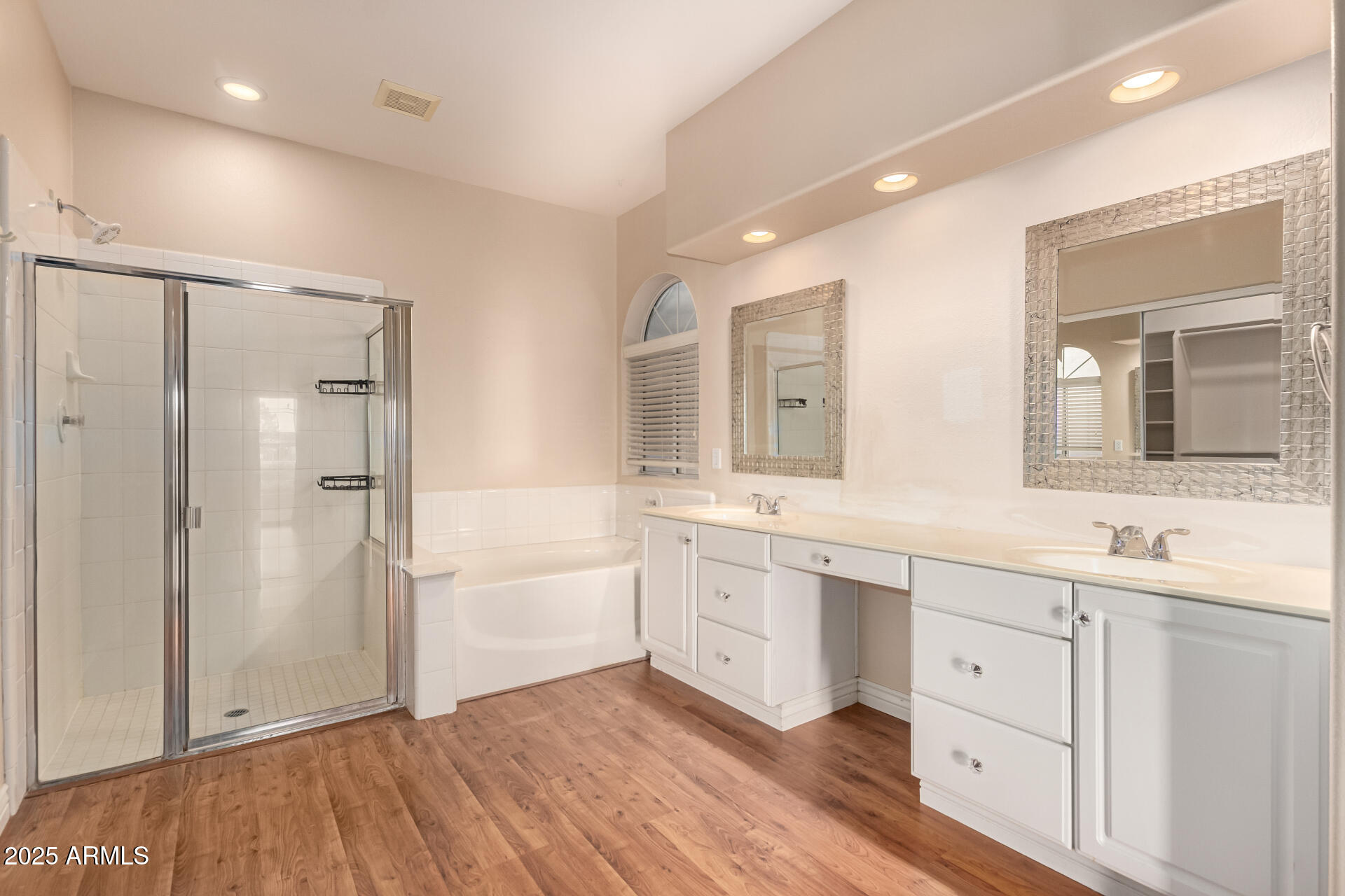 1284 North Conner Avenue Gilbert, AZ 85209 - Photo 21 of 45 a bathroom with a double vanity sink a mirror and a shower