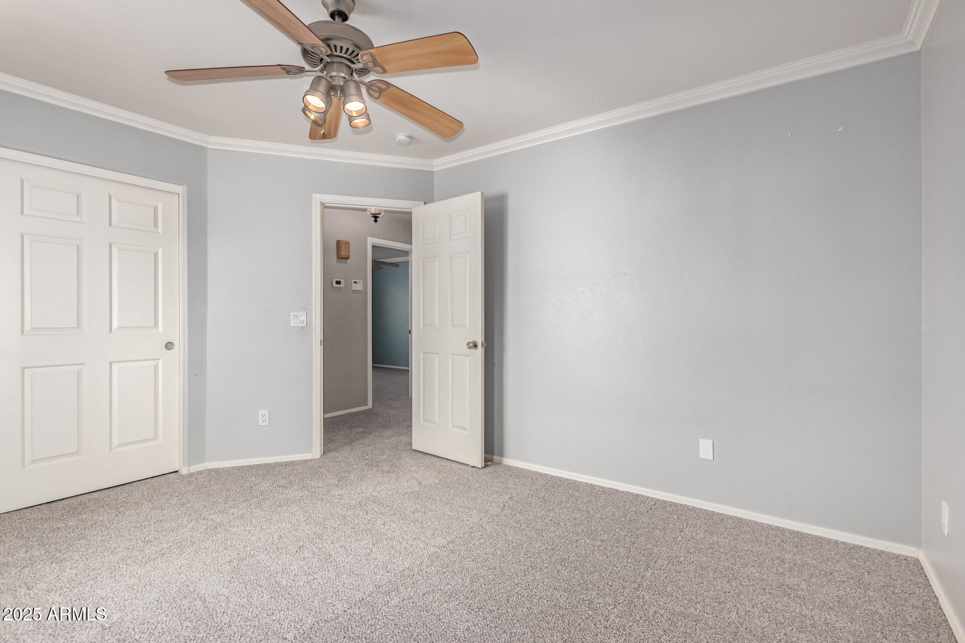 1284 North Conner Avenue Gilbert, AZ 85209 - Photo 29 of 45 an empty room with chandelier fan