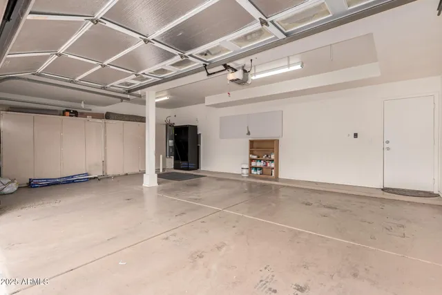 a view of a street with a tree