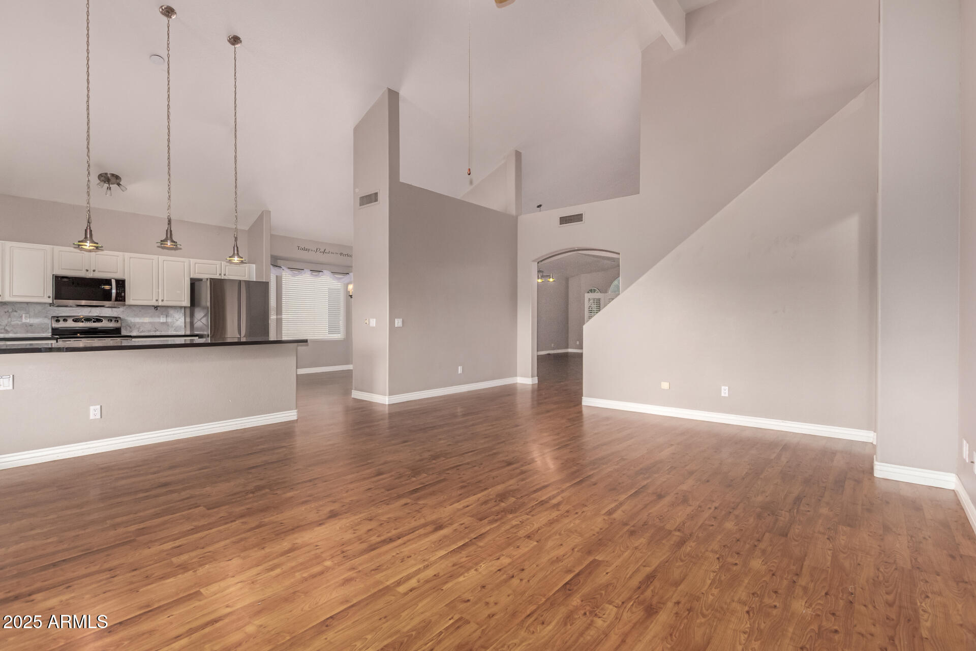1284 North Conner Avenue Gilbert, AZ 85209 - Photo 9 of 45 a view of a kitchen with wooden floor