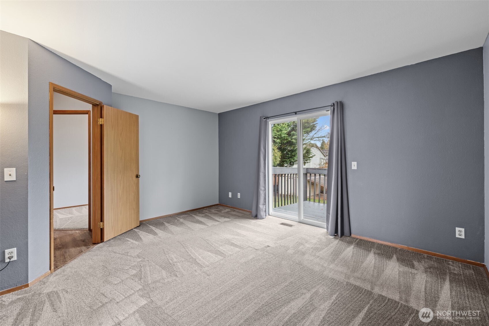 21641 Southeast 266th Street Maple Valley, WA 98038 - Photo 17 of 40 a view of a big room with windows and closet