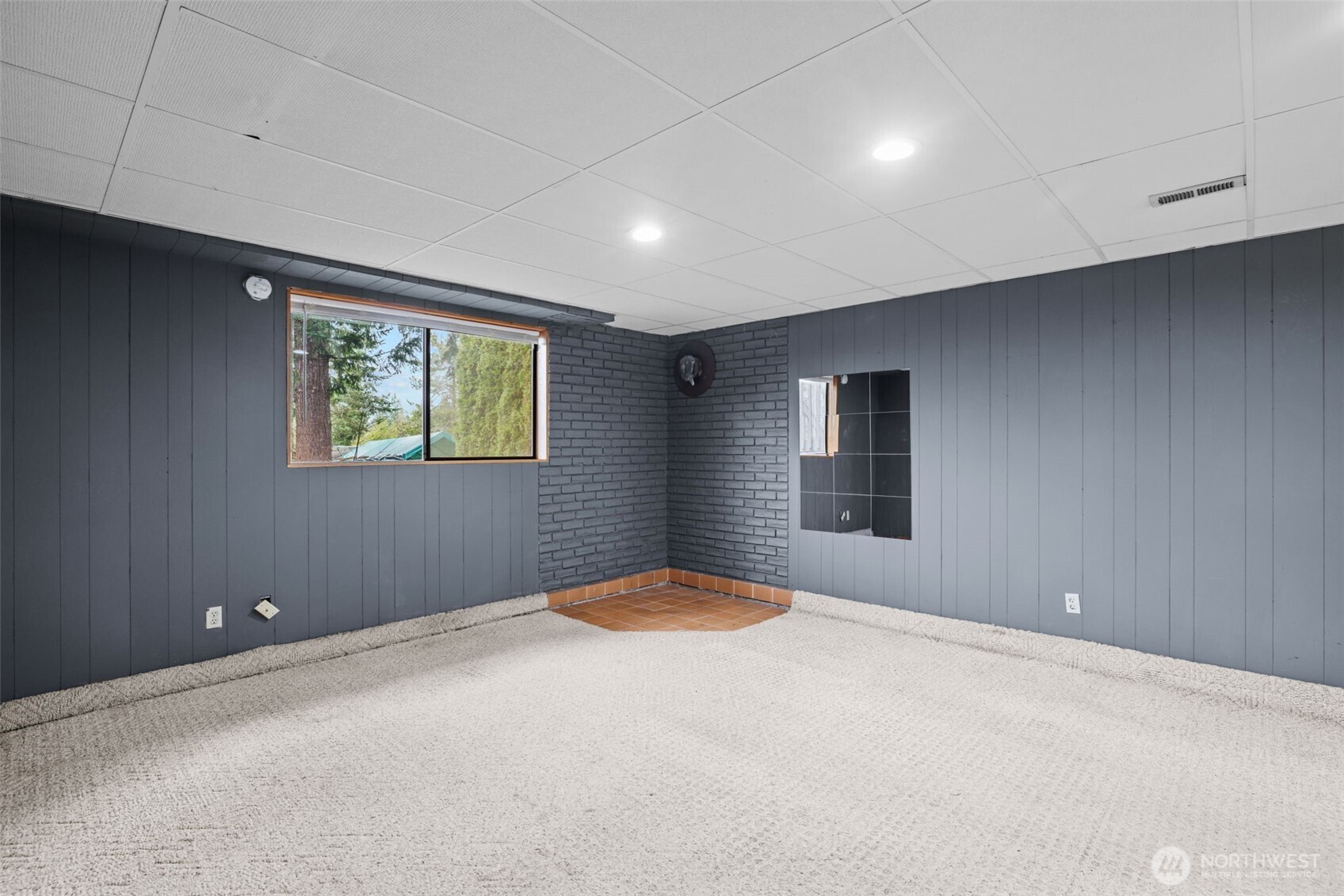 21641 Southeast 266th Street Maple Valley, WA 98038 - Photo 24 of 40 a view of an empty room with windows