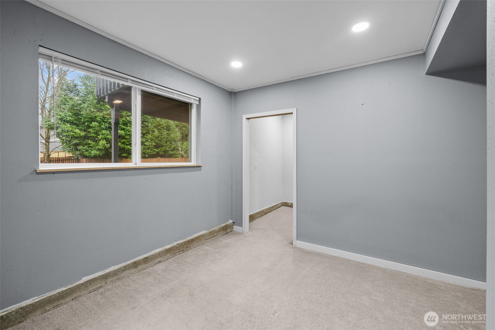21641 Southeast 266th Street Maple Valley, WA 98038 - Photo 28 of 40 an empty room with windows