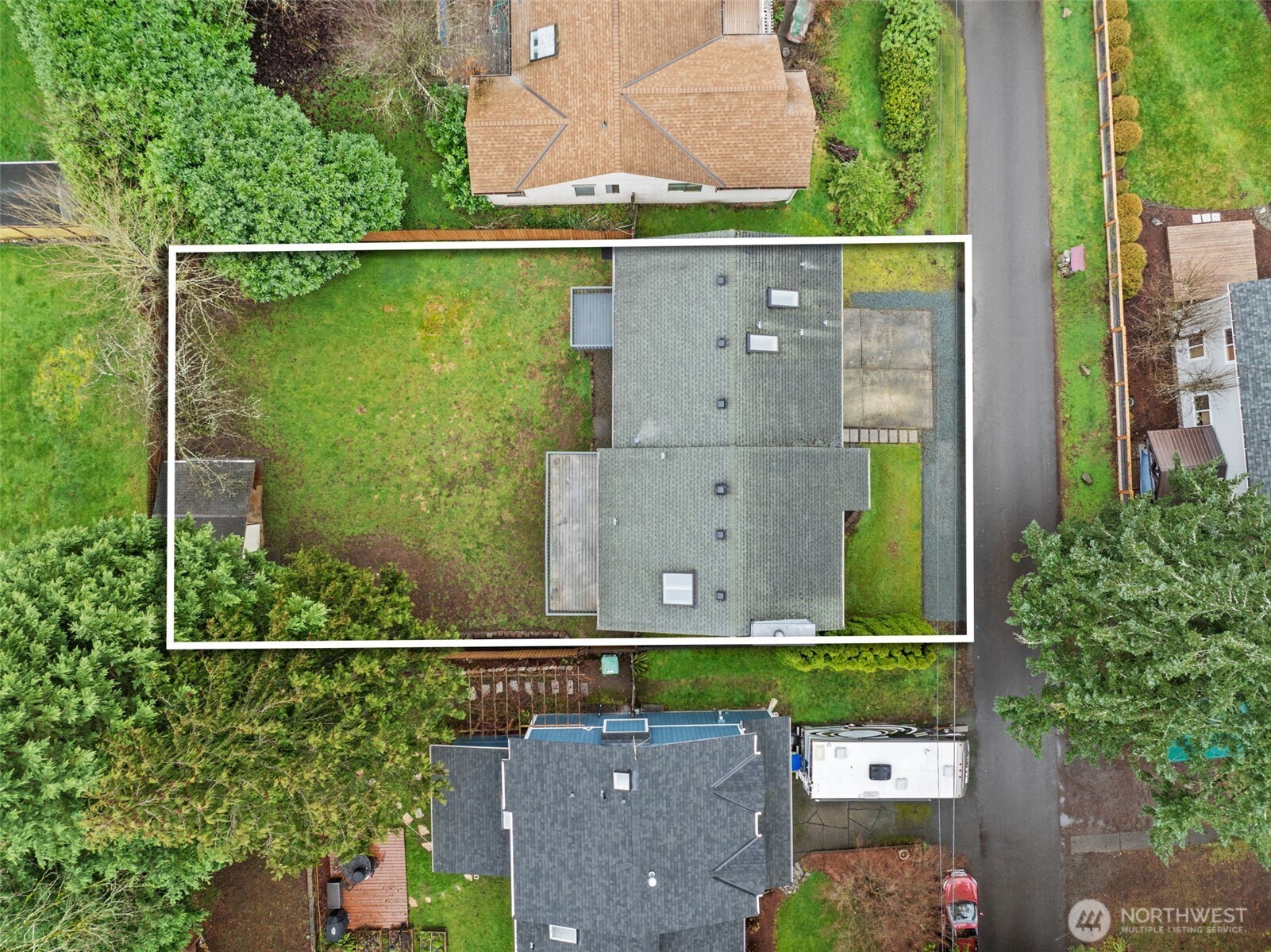 21641 Southeast 266th Street Maple Valley, WA 98038 - Photo 38 of 40 an aerial view of a house with a garden