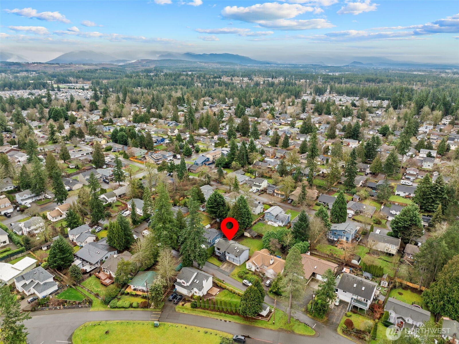 21641 Southeast 266th Street Maple Valley, WA 98038 - Photo 39 of 40 an aerial view of residential houses with yard
