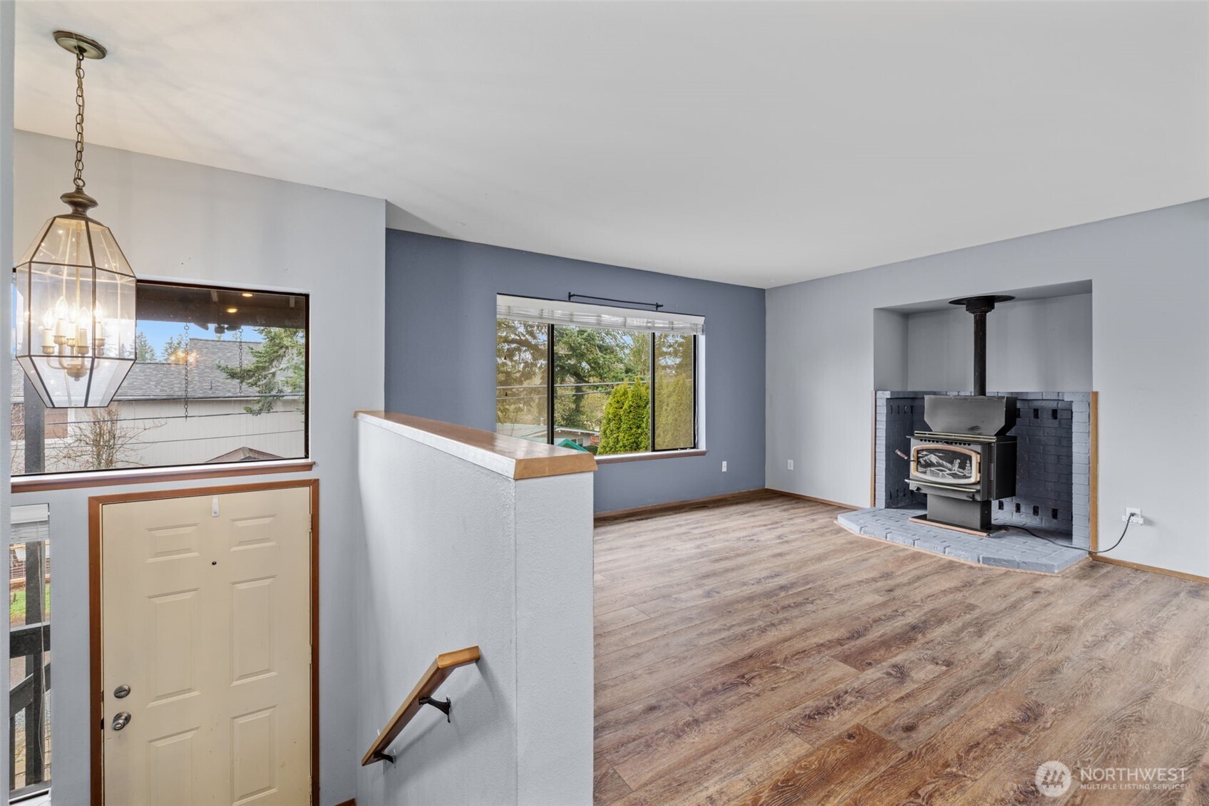 21641 Southeast 266th Street Maple Valley, WA 98038 - Photo 5 of 40 a view of a livingroom with furniture and a window