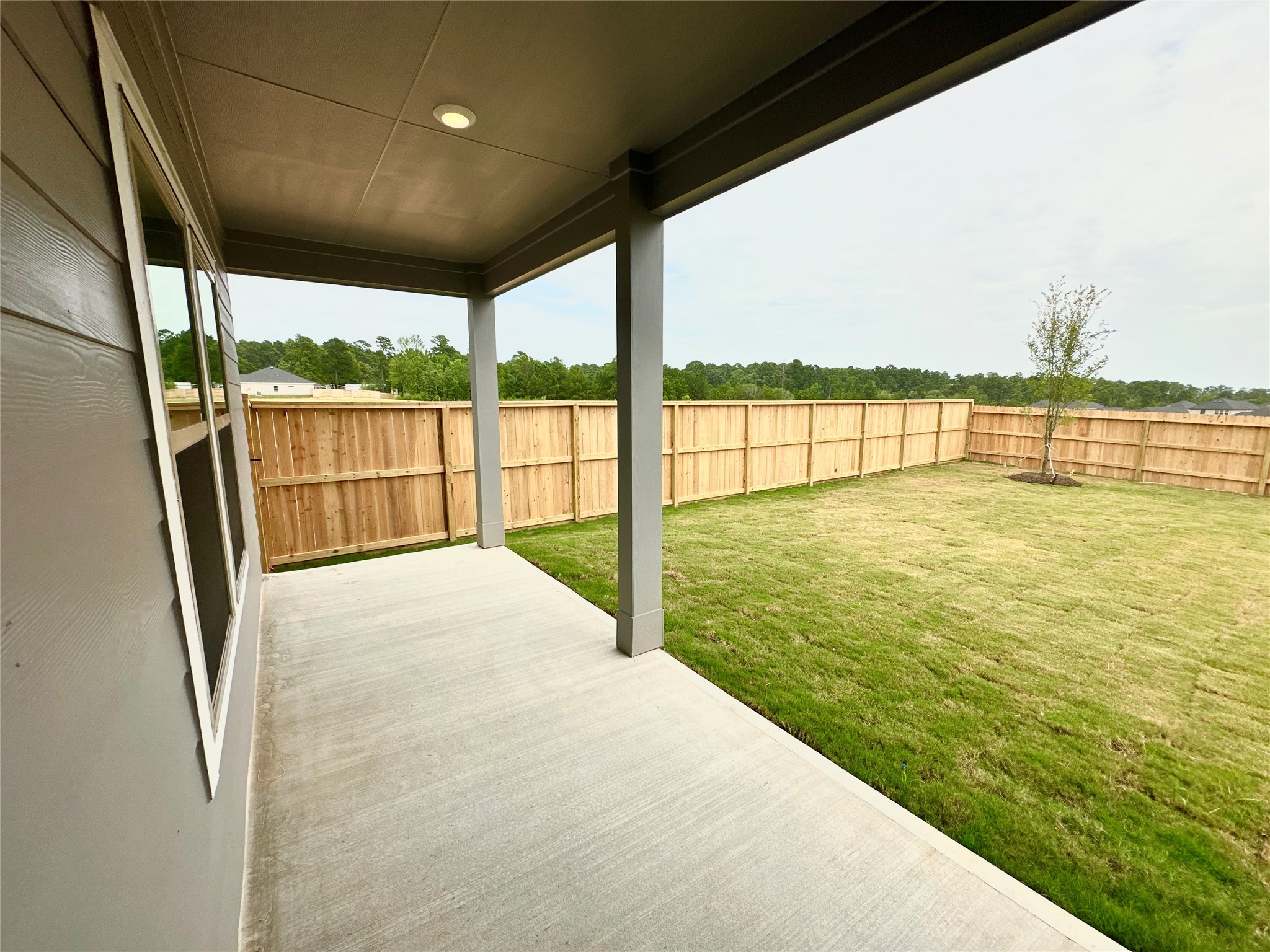 12198 Ridge Top Drive Conroe, TX 77304 - Photo 17 of 27 Big covered back patio.