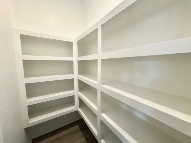 a view of kitchen with wooden floor