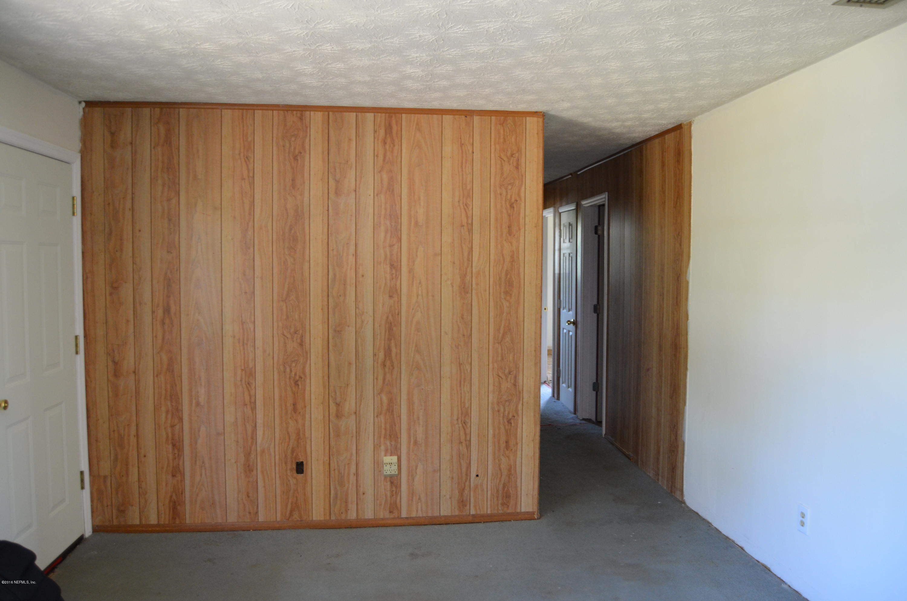 96633 Chester Road Yulee, FL 32097 - Photo 8 of 17 a view of wooden door
