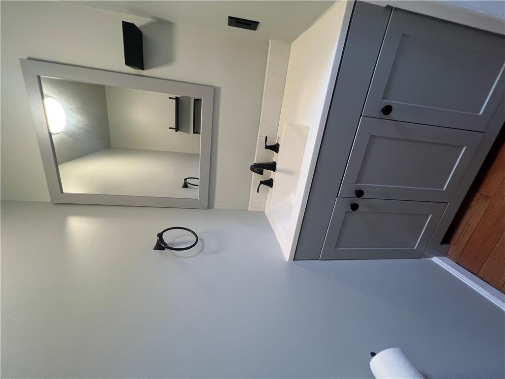 896 Briarstone Road Bethlehem, PA 18017 - Photo 20 of 37 Modern vanity with dark fixtures define this powder room.