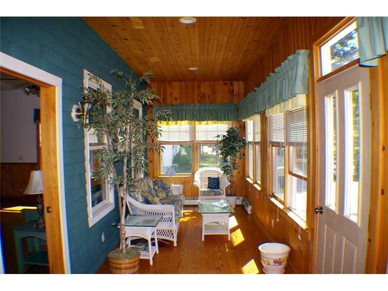 14 Quest Avenue Sebago, ME 04029 - Photo 13 of 31 Sunroom. Enclosed Porch