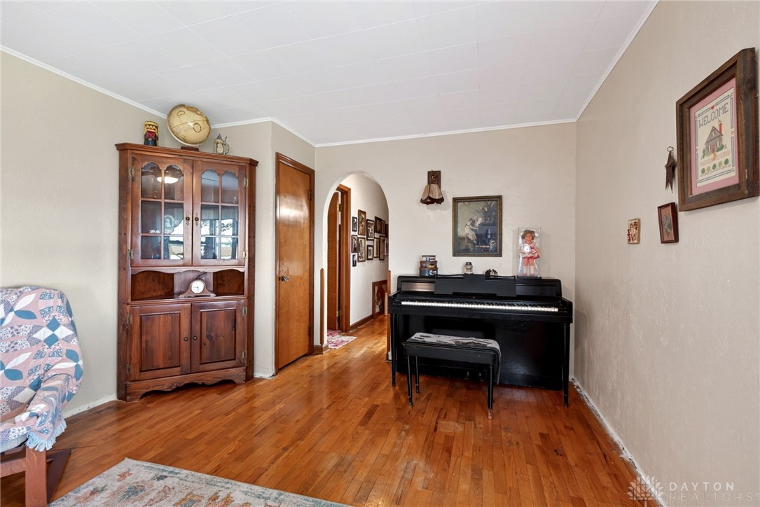 2470 Clark Run Road Xenia, OH 45385 - Photo 14 of 57 This inviting living space features gleaming hardwood floors and classic architectural details.