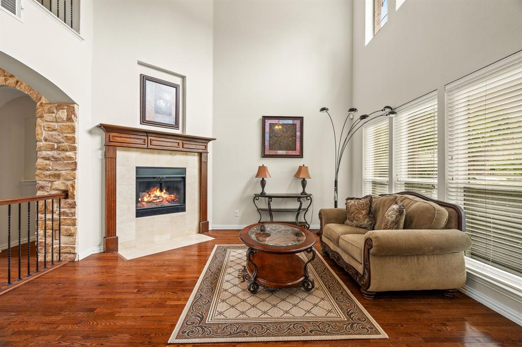 2012 Burnside Drive Allen, TX 75013 - Photo 7 of 40 a living room with furniture and a fireplace