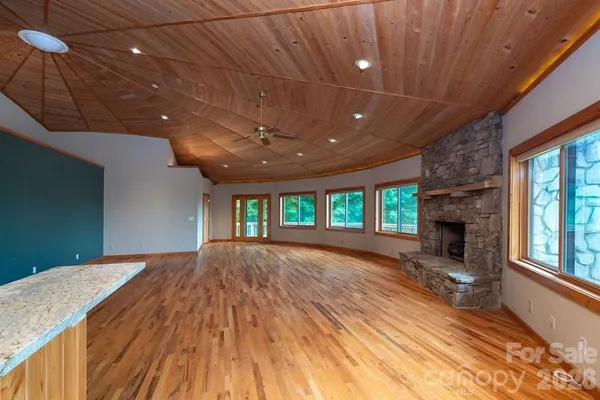 a view of livingroom with fireplace and window