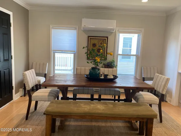 a kitchen with kitchen island a sink stainless steel appliances and cabinets