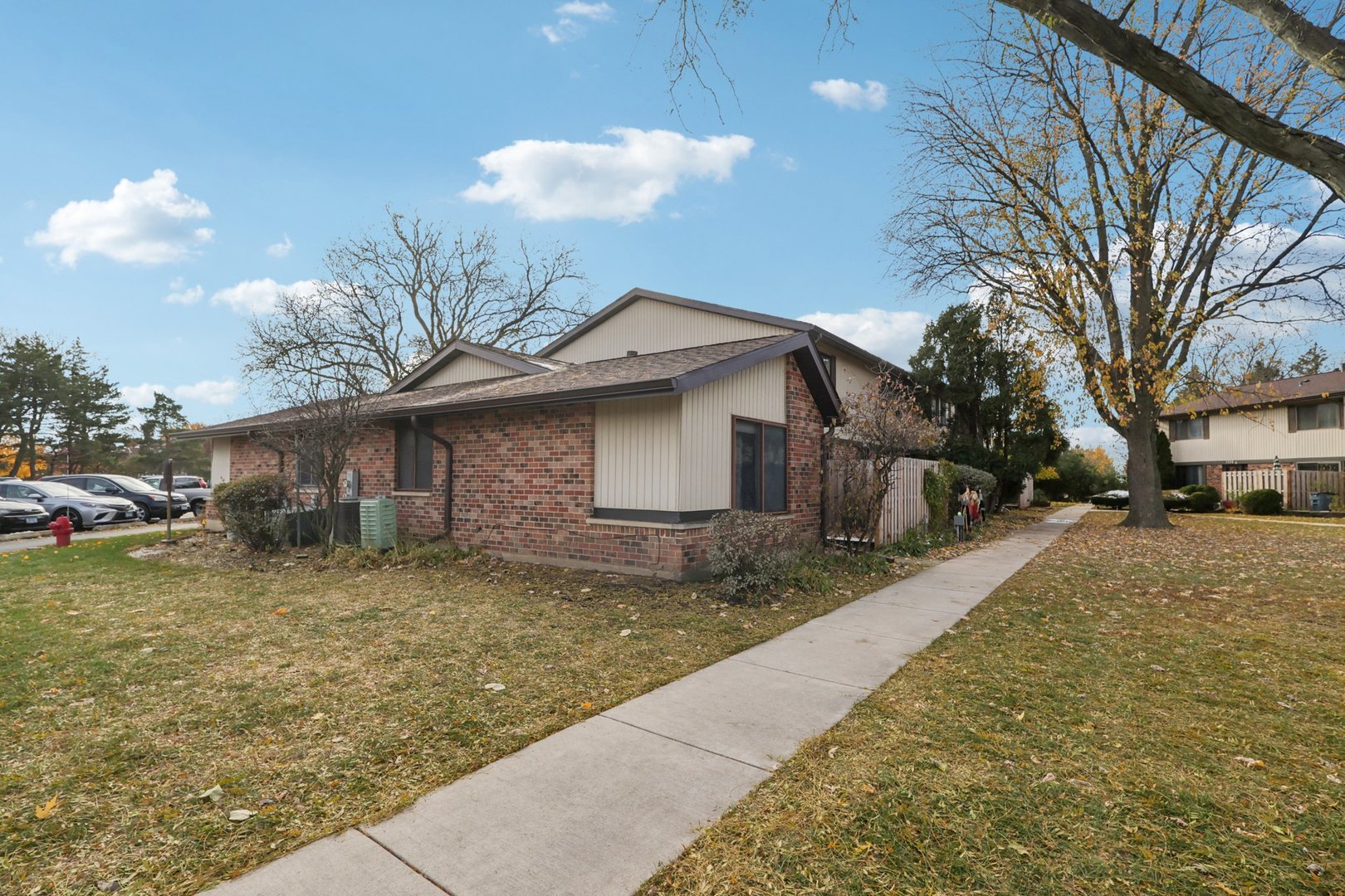 7344 Country Creek Way, Unit 8 Downers Grove, IL 60516 - Photo 5 of 17 a view of a house with a yard