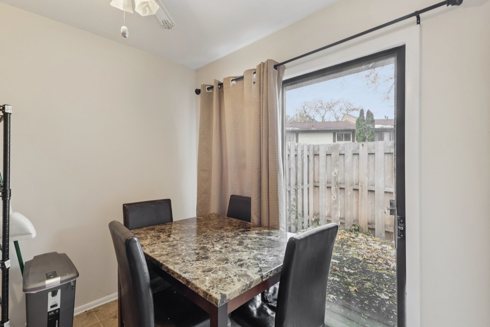 7344 Country Creek Way, Unit 8 Downers Grove, IL 60516 - Photo 8 of 17 a view of a dining table and chairs in a room
