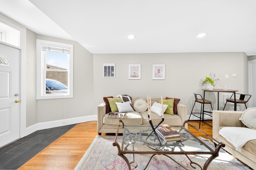 352 Tappan Street, Unit 1 Brookline, MA 02445 - Photo 8 of 42 a outdoor living space with furniture and a window