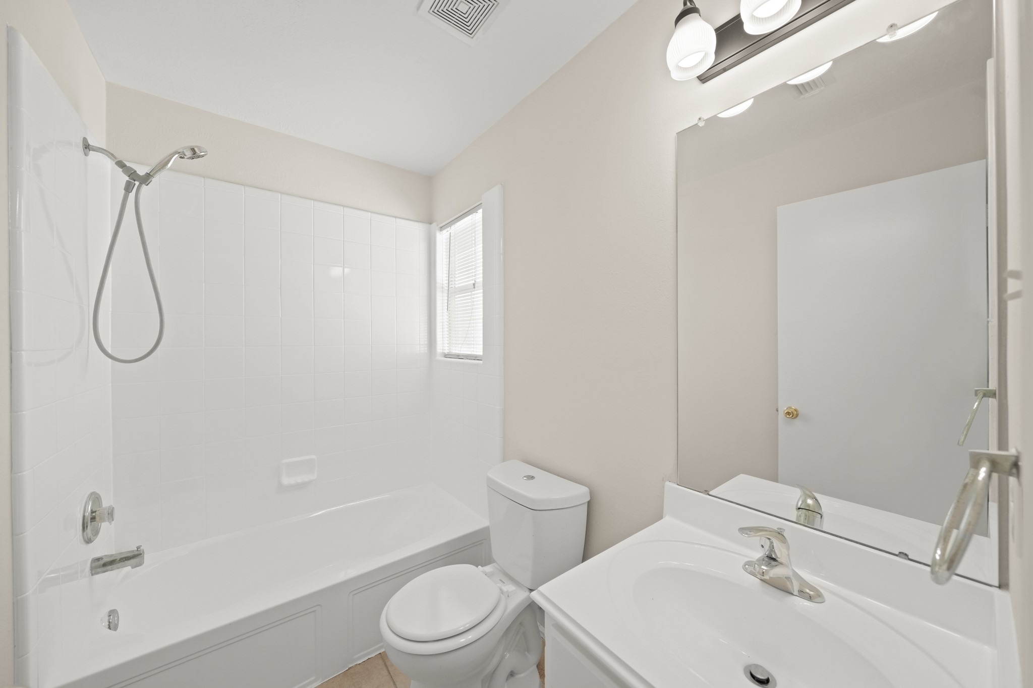 1426 Cartwright Road Missouri City, TX 77489 - Photo 20 of 26 a bathroom with a sink a toilet and shower