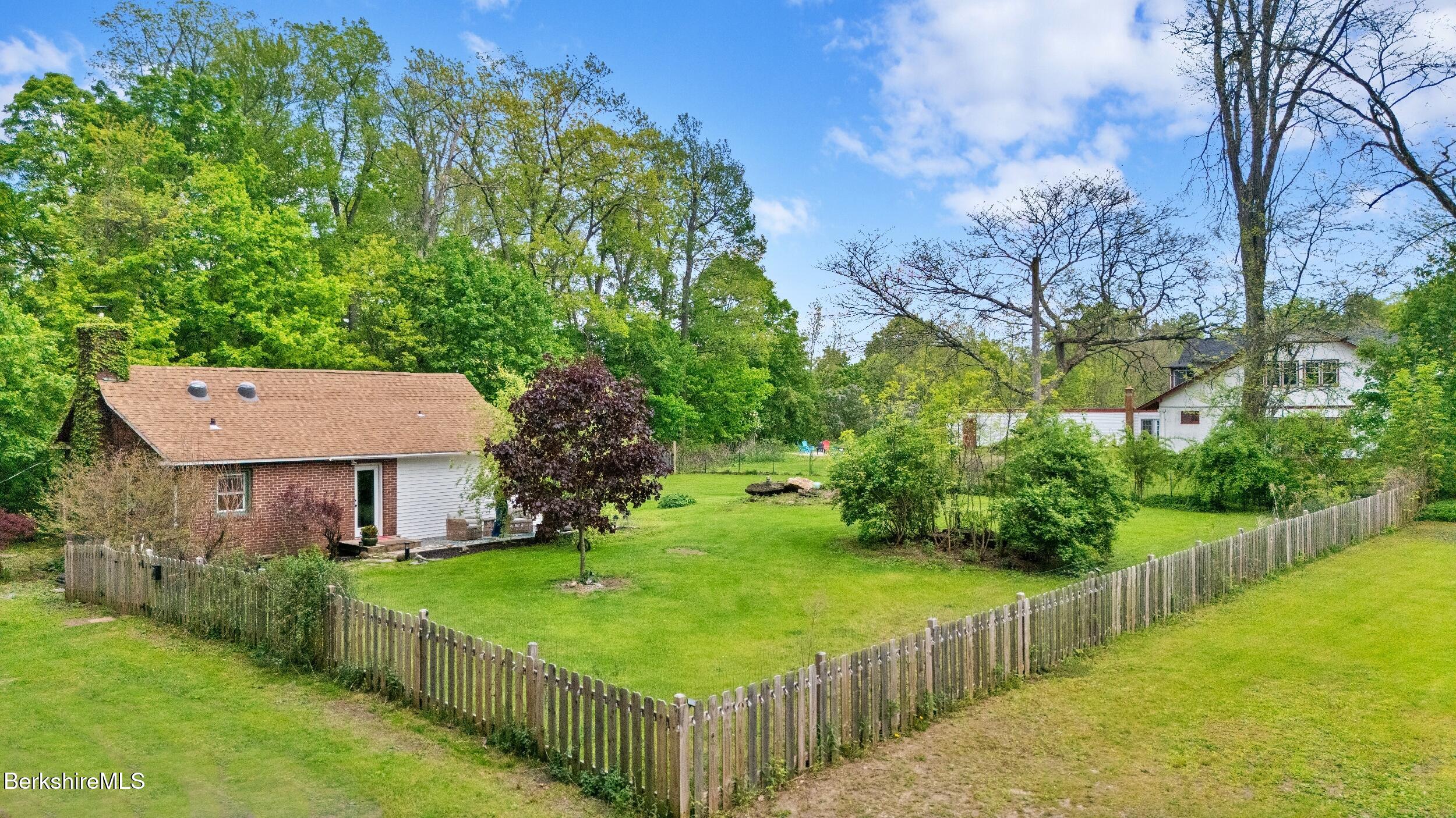20 East Dugway Road Lenox, MA 01240 - Photo 51 of 84 a view of a house with backyard and garden