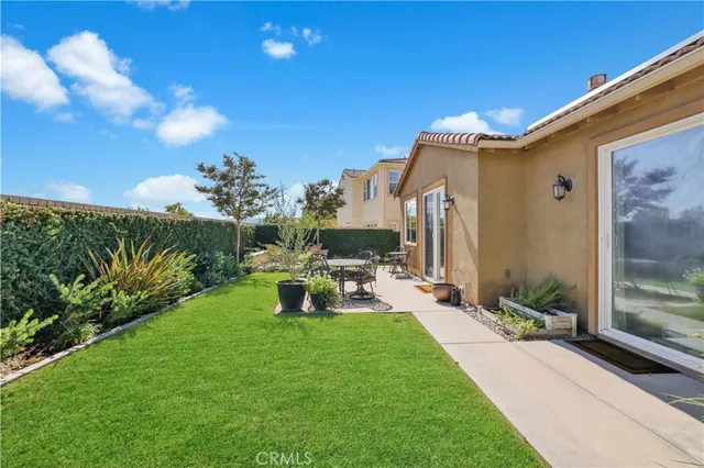 front view of a house with a garden