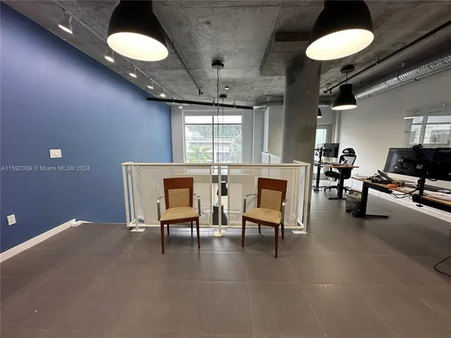 a room with furniture and a window