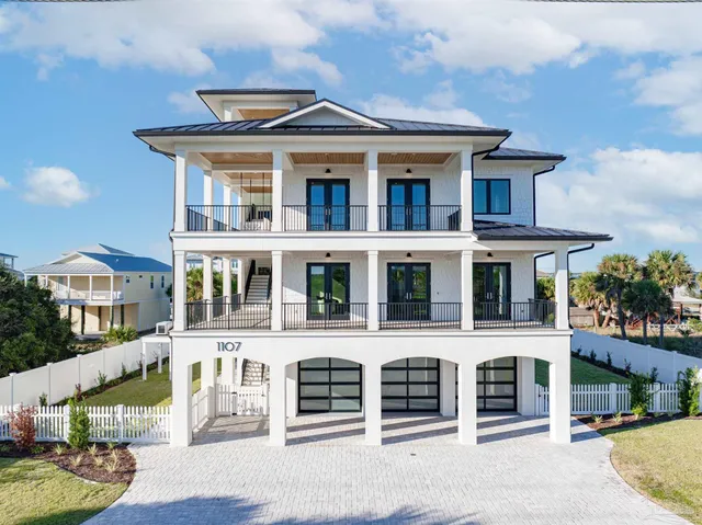 a living room with fireplace furniture and a flat screen tv