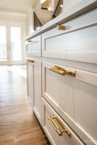 a bathroom with a shower and a sink