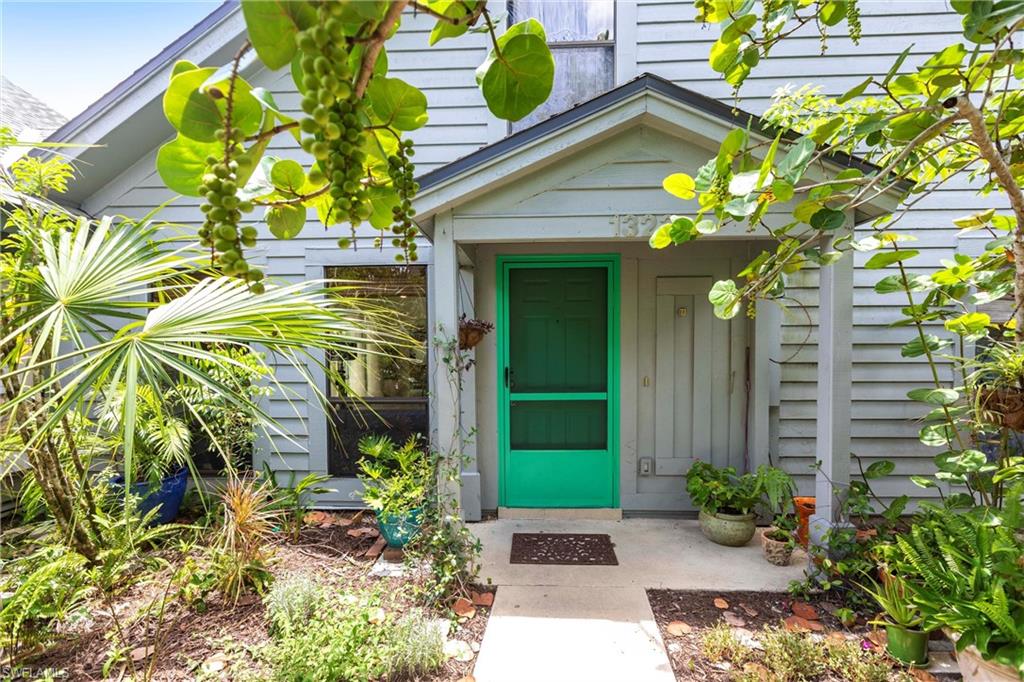 a house with a flower garden