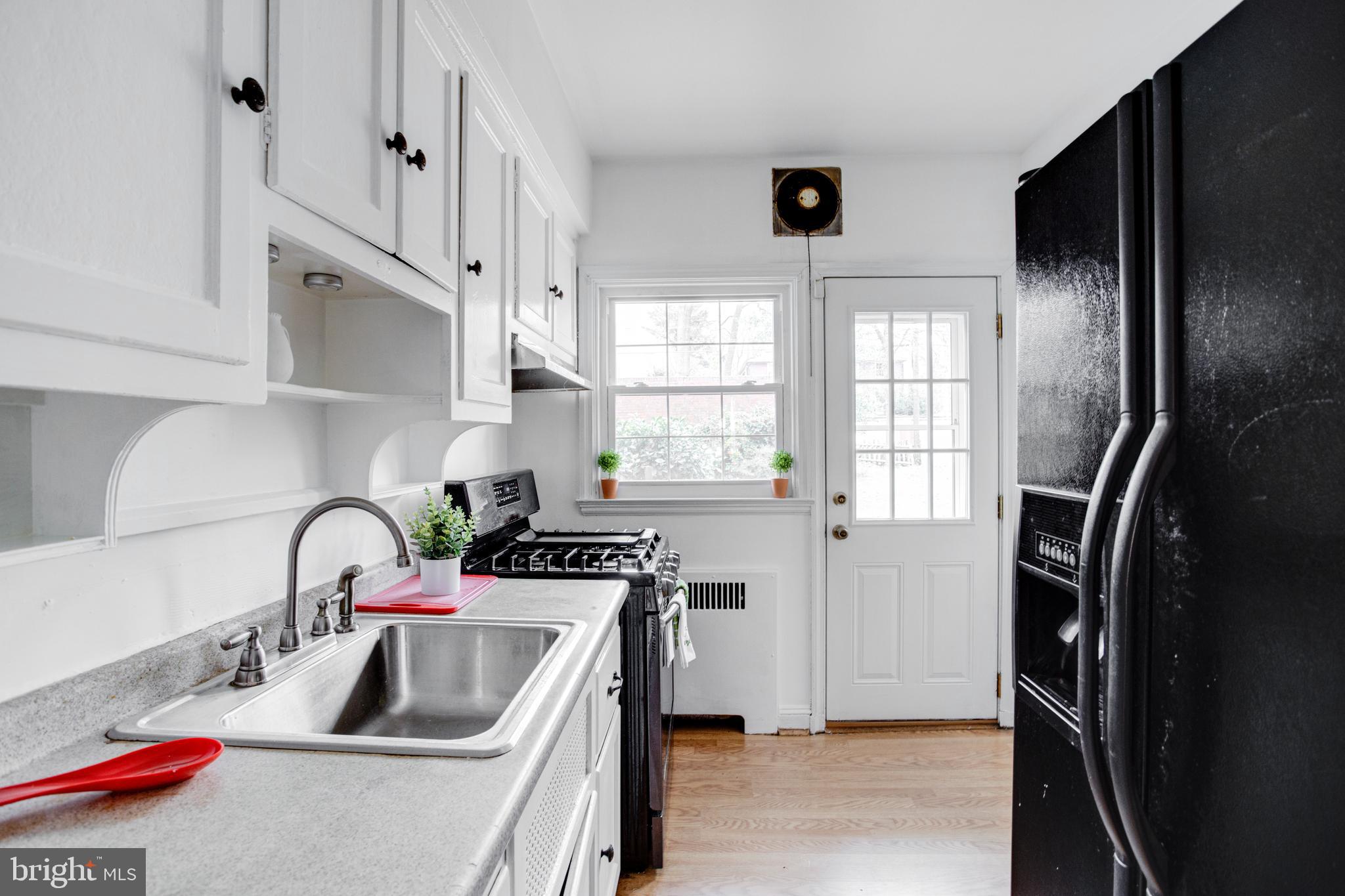 4210 Kelway Road Baltimore, MD 21218 - Photo 11 of 30 Gorgeous Kitchen with freshly painted cabinets!