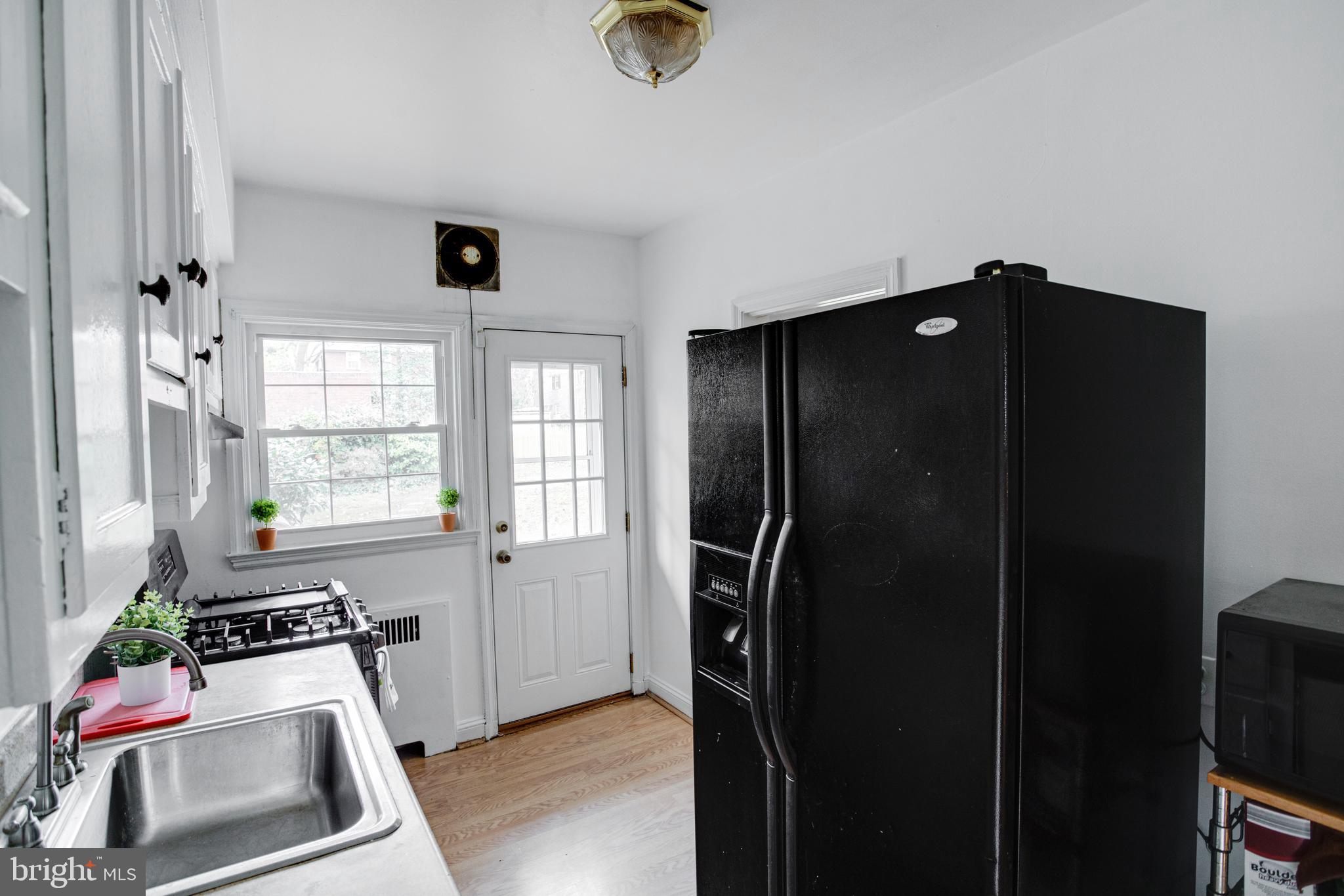 4210 Kelway Road Baltimore, MD 21218 - Photo 12 of 30 Gorgeous Kitchen with freshly painted cabinets!