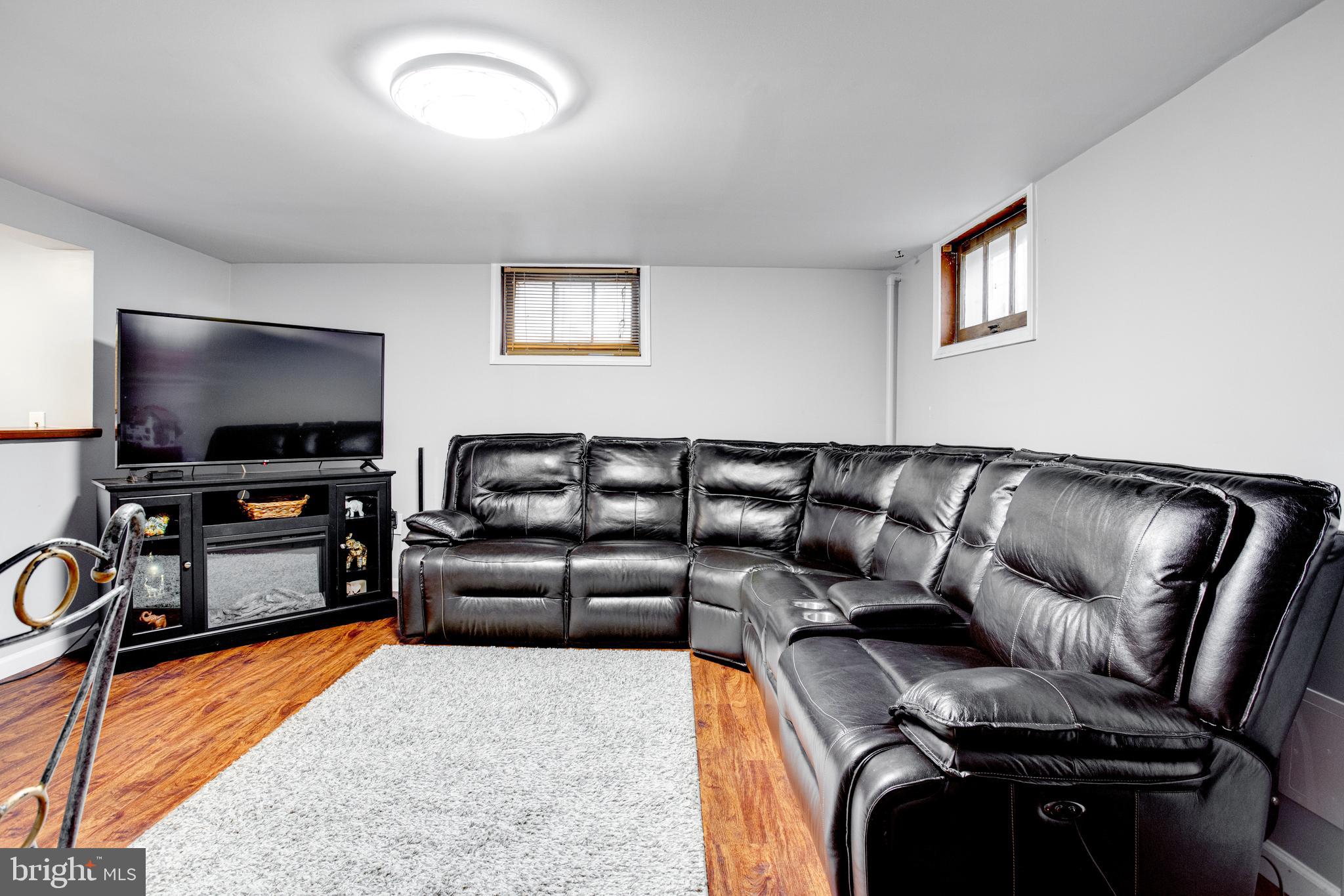 4210 Kelway Road Baltimore, MD 21218 - Photo 21 of 30 Spacious Lower Level Family Room with bar!