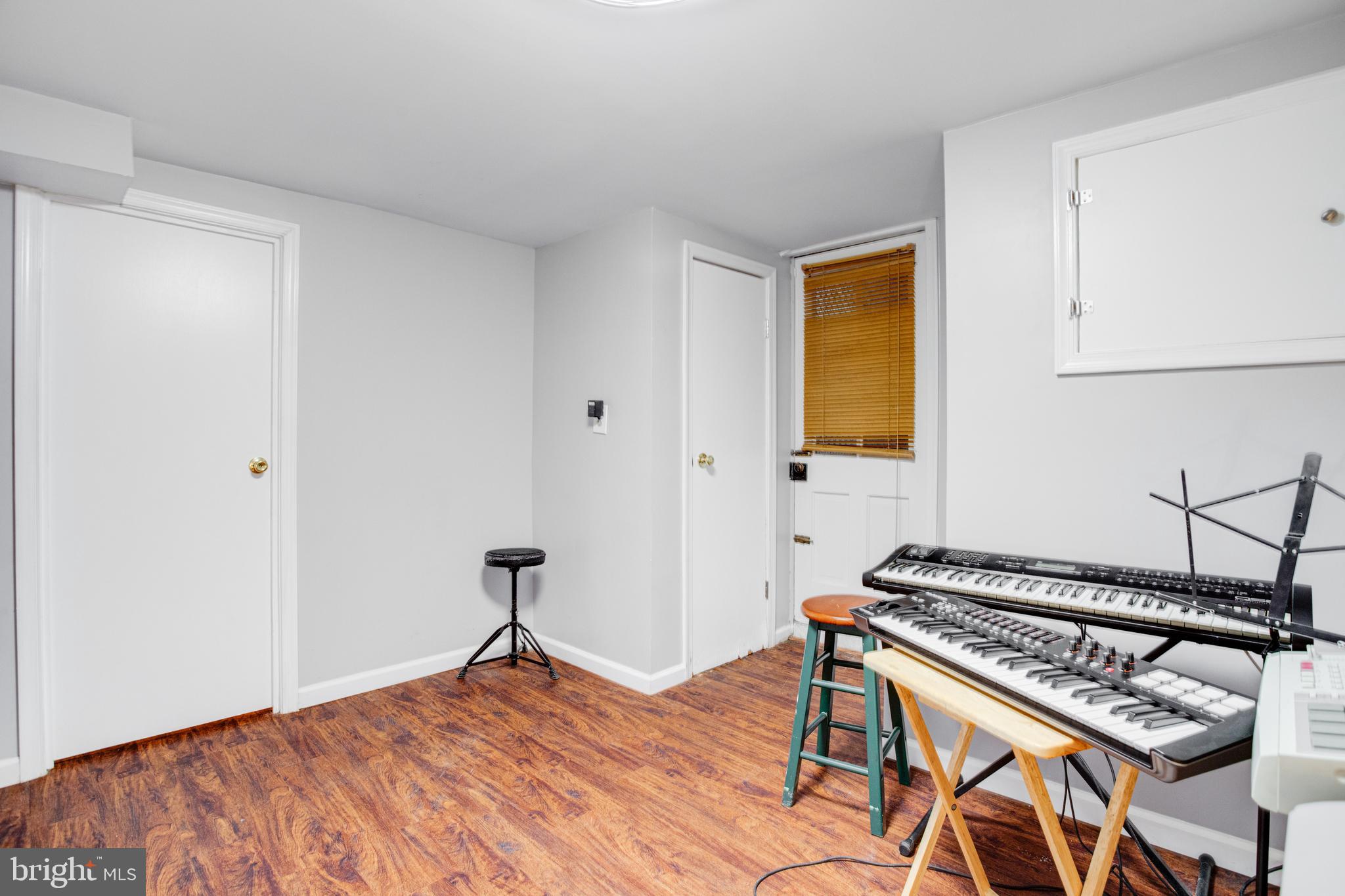 4210 Kelway Road Baltimore, MD 21218 - Photo 25 of 30 Hobby Room with vinyl flooring!