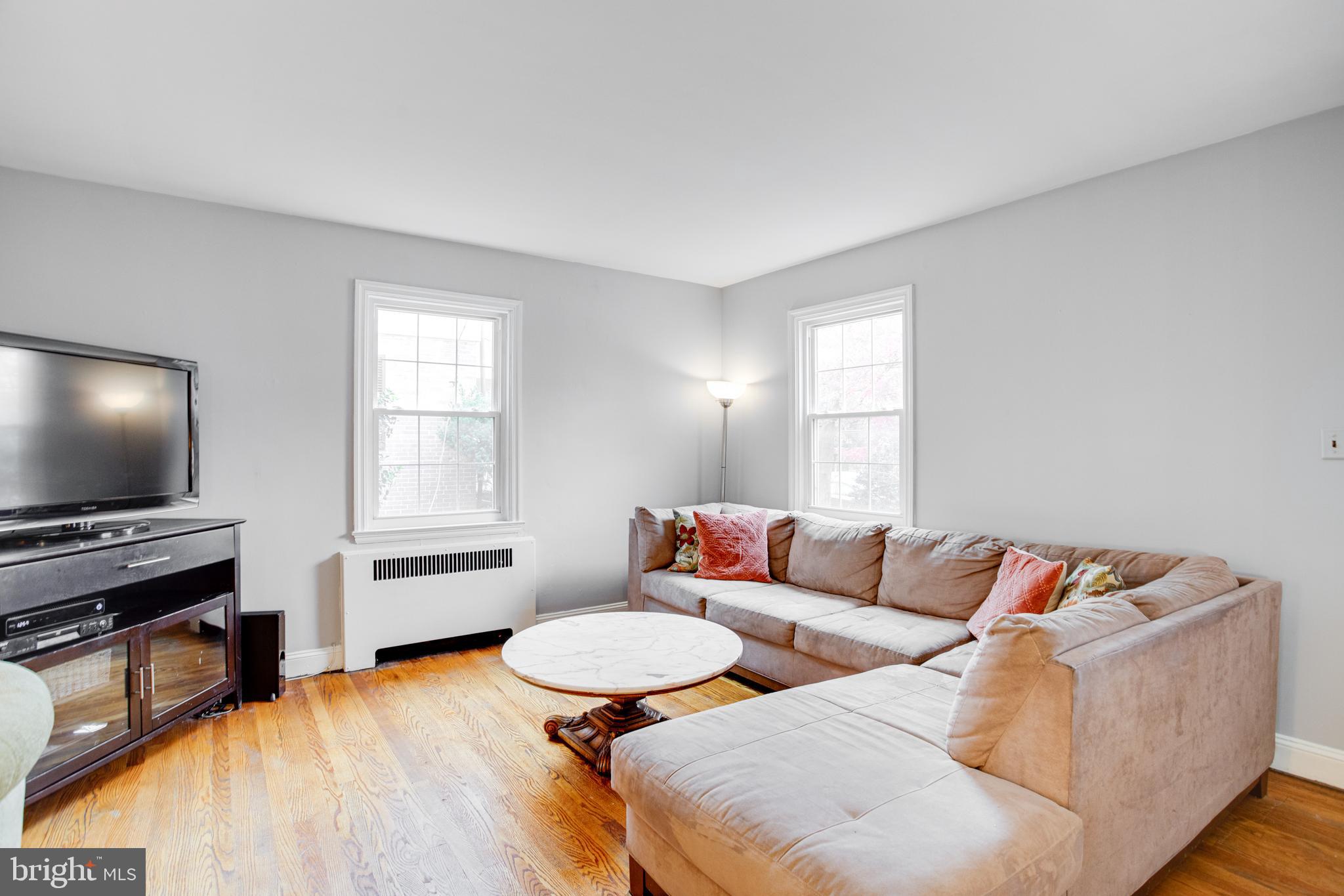 4210 Kelway Road Baltimore, MD 21218 - Photo 4 of 30 Spacious Living Room with gleaming hardwood floors