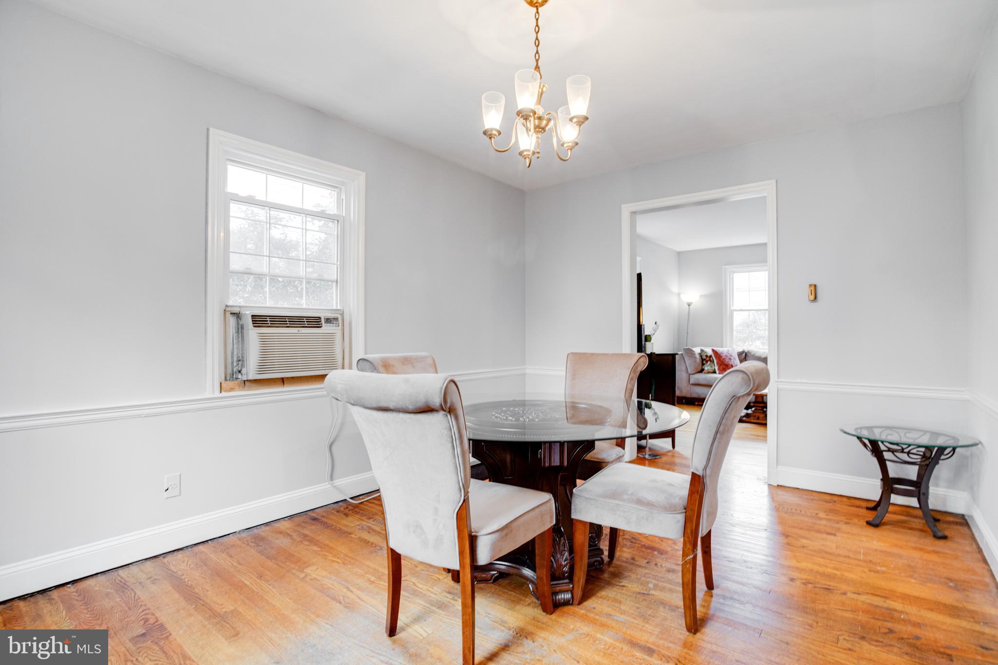 4210 Kelway Road Baltimore, MD 21218 - Photo 6 of 30 Spacious Dining Room with gleaming hardwood floors