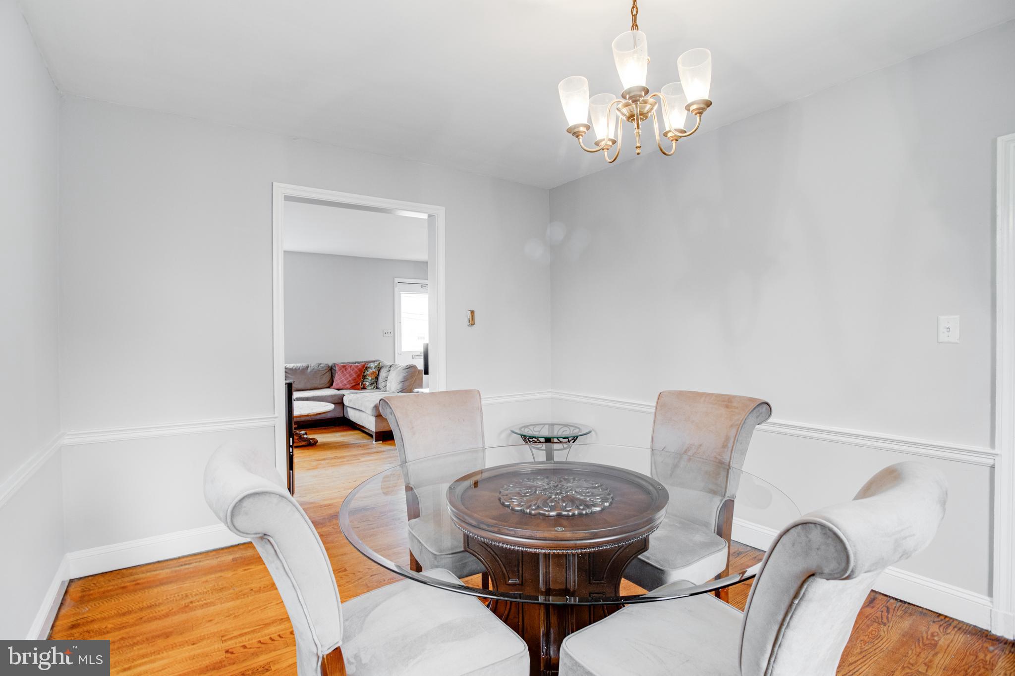 4210 Kelway Road Baltimore, MD 21218 - Photo 7 of 30 Spacious Dining Room with gleaming hardwood floors