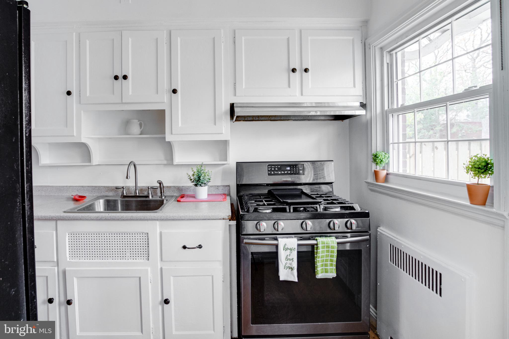 4210 Kelway Road Baltimore, MD 21218 - Photo 8 of 30 Gorgeous Kitchen with freshly painted cabinets!