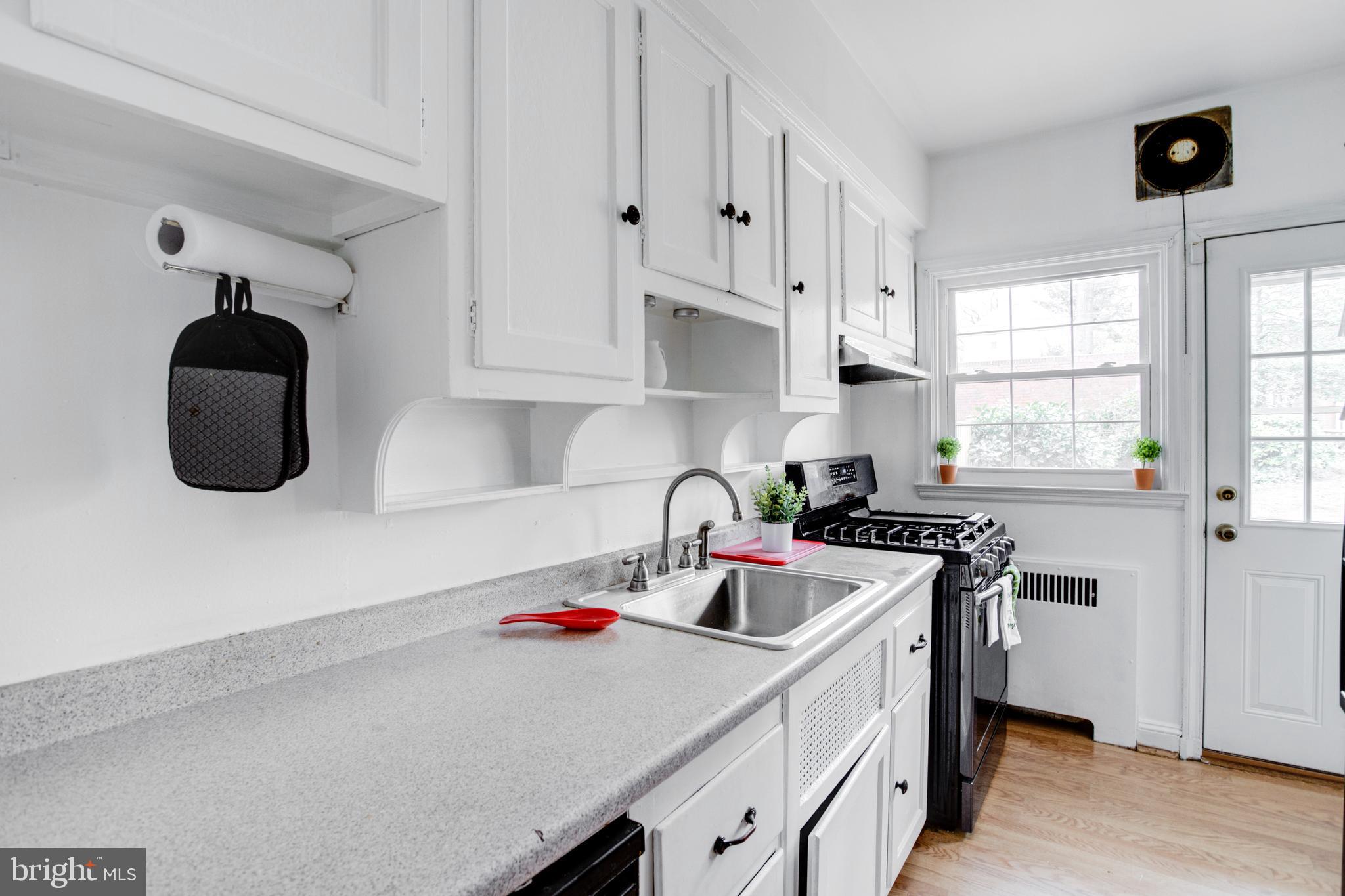 4210 Kelway Road Baltimore, MD 21218 - Photo 10 of 30 Gorgeous Kitchen with freshly painted cabinets!