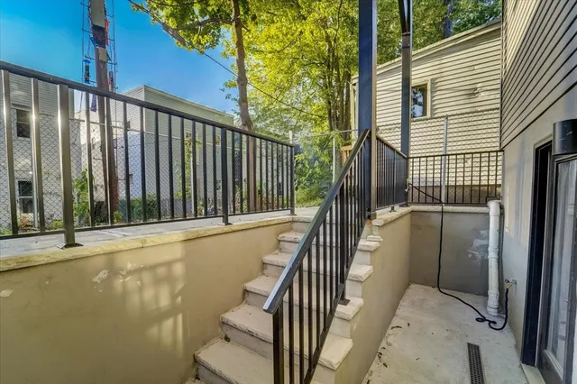 a view of a balcony with door