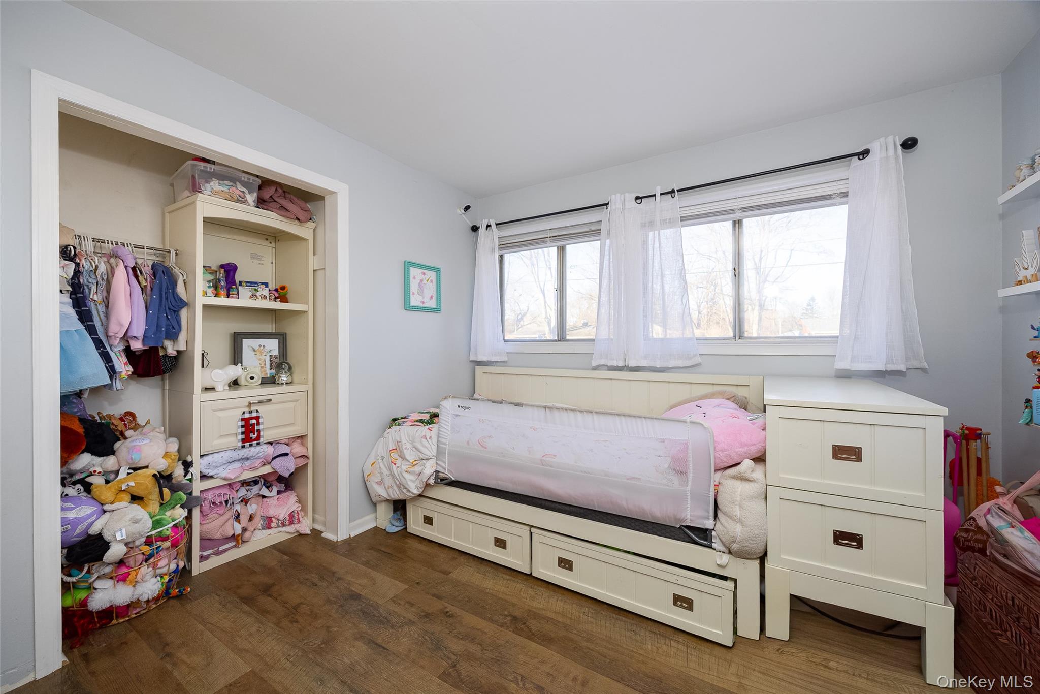 14 Princeton Street Red Hook, NY 12571 - Photo 12 of 17 a bedroom with a bed and a window