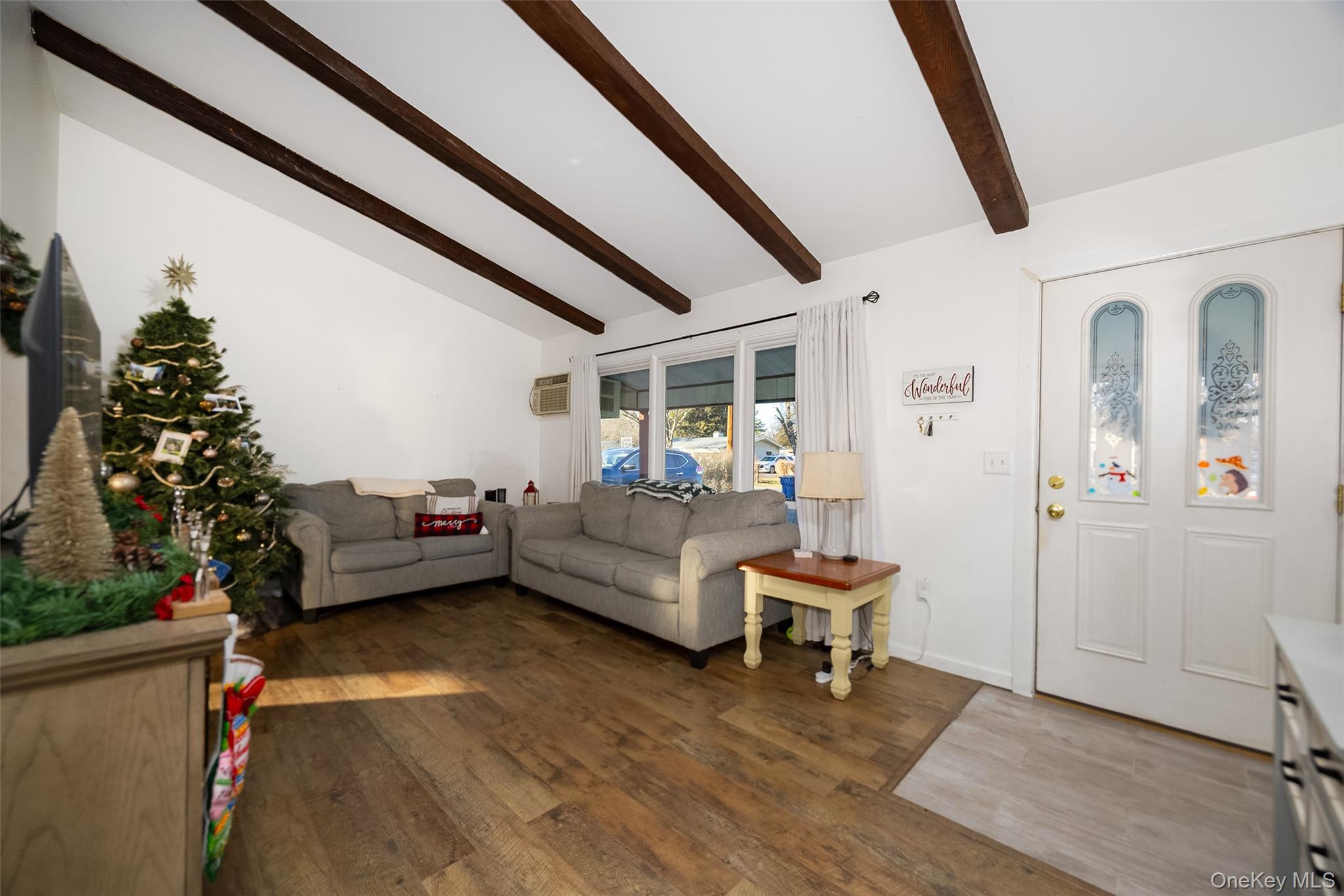 14 Princeton Street Red Hook, NY 12571 - Photo 2 of 17 a living room with furniture and a wooden floor