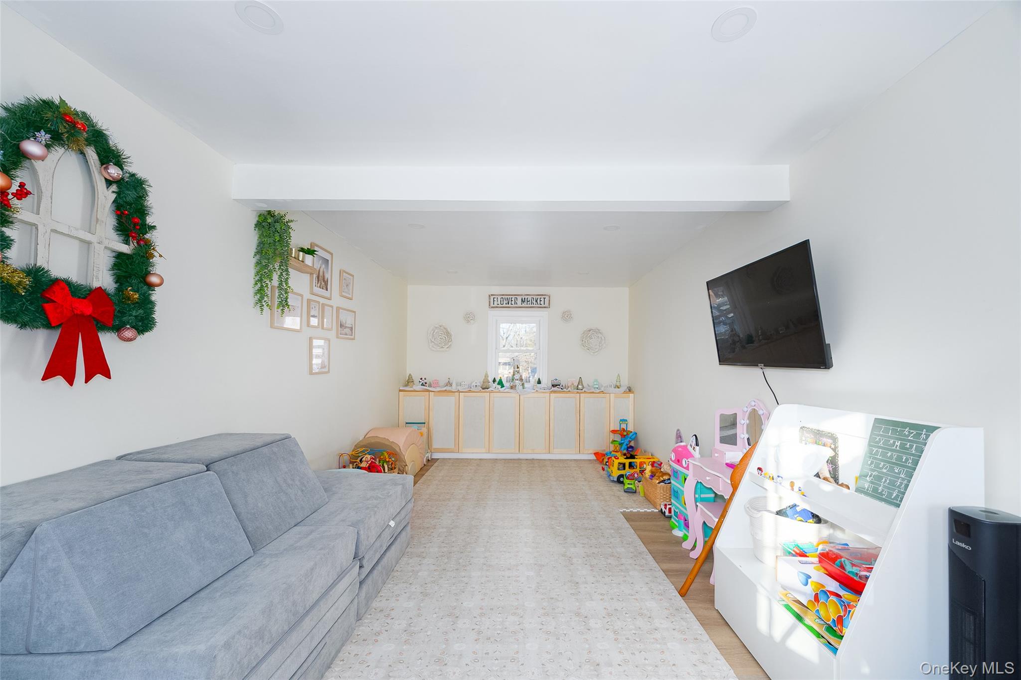 14 Princeton Street Red Hook, NY 12571 - Photo 7 of 17 a living room with furniture and a flat screen tv