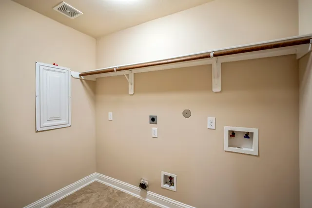 a view of room with window and ceiling fan